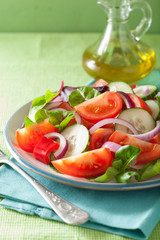 healthy tomato salad with onion cucumber pepper