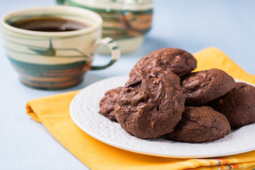 Homemade chocolate cookies on white plate