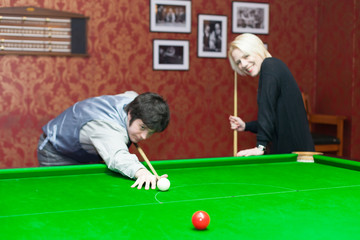people playing snooker