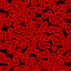 Extreme closeup of a red blood cells on a black background.