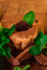 muffin spilled with chocolate and mint