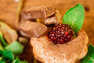 muffin spilled with chocolate and mint