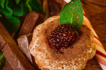 peppermint candy chocolate muffin with blackberries and mint 
