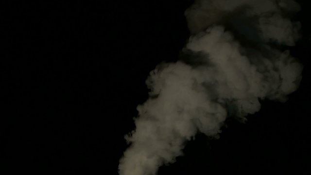 Real smoke isolated on black background