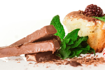 muffins with chocolate decorated with mint