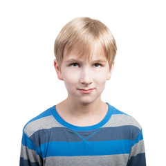Studio portrait of a smiling preteen boy, white background