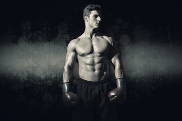 Composite image of muscular boxer