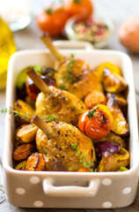 Crispy Baked Chicken Leg with vegetables and herbs