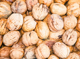 Dried whole walnuts on market in Catania, Sicily