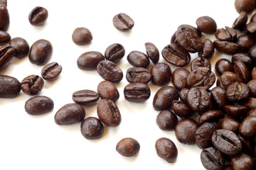 Brown coffee beans isolated on white background