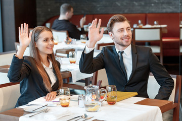 Greeting acquaintances during the business lunch