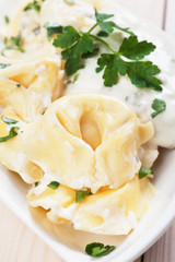 Tortellini pasta in cheese sauce
