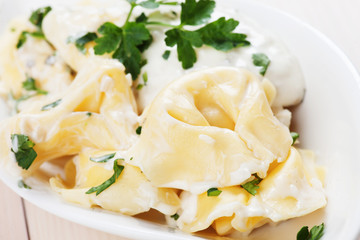 Tortellini pasta in cheese sauce