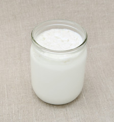 Kefir (tibetan,milk) fungus in jar with milk.