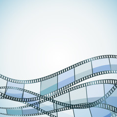 Fototapeta premium blue cinema background with color filmstrip