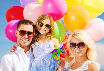 family with colorful balloons