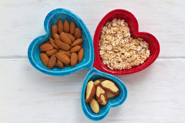 Ceramic heart shape bowls with healthy breakfast items