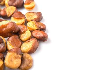 Salted broad beans or vicia faba over white background