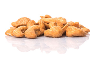 Roasted and salted cashew nut over white background