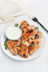 Baked chicken wings with sauce