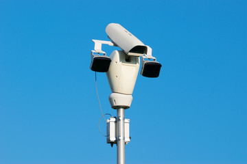 Surveillance Camera and Blue Sky