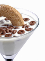 Yogurt and chocolate cereals  on white background