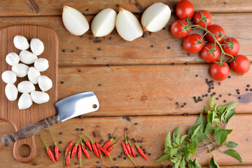 Preparation of Italian food on wood - Mozzarella, onions, tomato