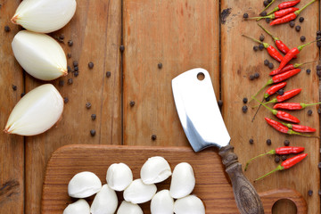 Preparation of Italian food on wood - Mozzarella, onions, pepper