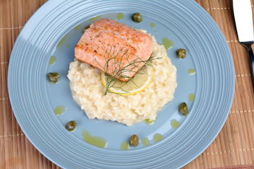 salmon fillet with lemon and dill risotto, capers seasoned