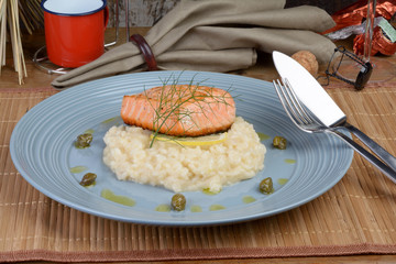 salmon fillet with lemon and dill risotto, capers seasoned