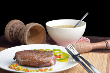 .steak with vinaigrette: sweet pepper, onion and tomato