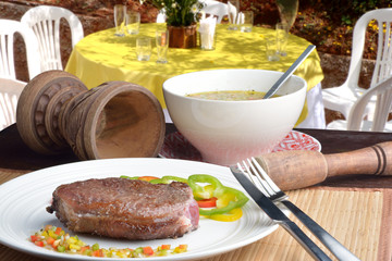 .steak with vinaigrette: sweet pepper, onion and tomato