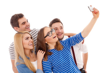Obraz premium Four stylish young people on white background