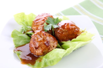 meatballs with sauce and lettuce