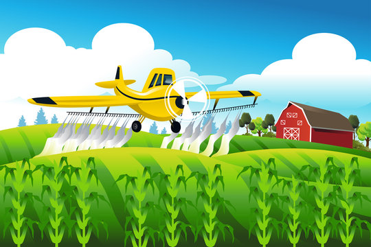 Crop duster flying over a field