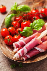 Italian prosciutto with tomato and basil