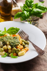 Colored gnocchi with pesto