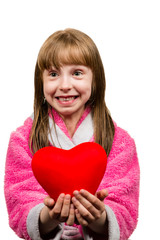 Little girl holding red heart, close-up isolated on white