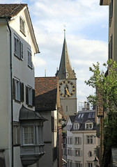 Clock tower of St. Peter's Church and street view, Zurich, Switz