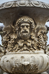 patterned stone floor vase park