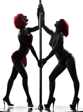two women pole dancer silhouette