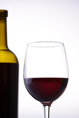 Wine bottle and glass