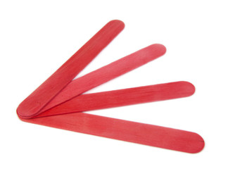 Six popsicle red sticks for arts and crafts on a white