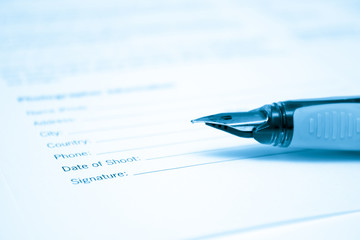 Pen and legal document for signature