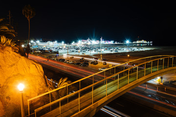 Pedestrian bridge over Pacific Coast Highway at night, in Santa