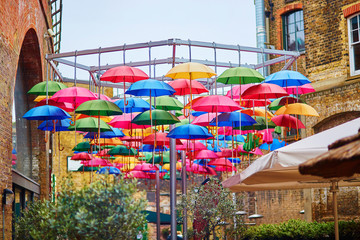 Colorful umbrellas on a street of London
