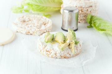rice cake with cream cheese and avocado