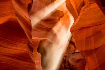 Beams of light shining through Antelope Canyon