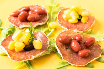 Tapas, pintxos with grilled sausages