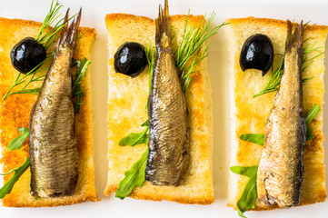 Smoked sardines on toast